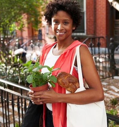 The internet says a 'cheerful resting face' is a lady with a plant and a loaf of bread.
