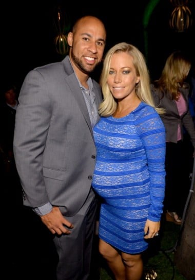Hank Baskett (L) and Kendra Wilkinson earlier this year. (Photo: Michael Buckner/Getty Images.)