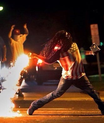 throwing tear gas in ferguson