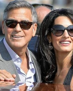 George Clooney and Amal Alamuddin arrive in Venice. Via: Getty Images