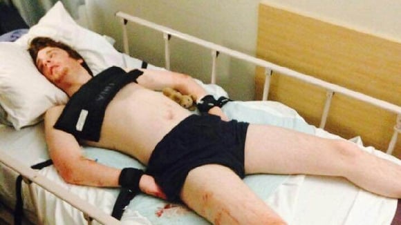 boy with autism shackled to bed