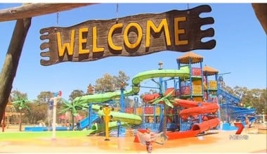 Boy suffers head injury after water slide fall.