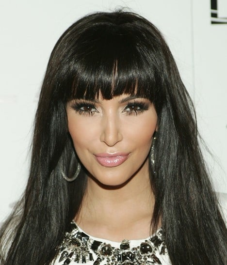 Kim debuting her new Hair on NYE 2011