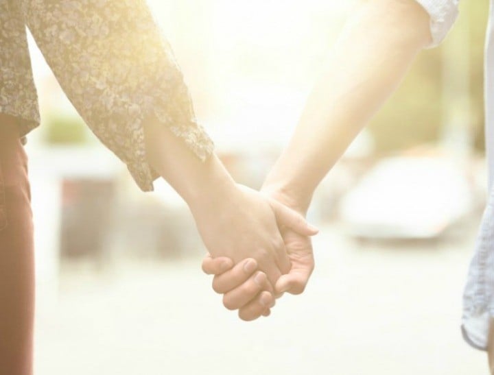 Couple holding hands lead resize