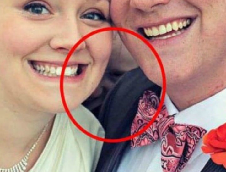 A Ghost Photobombed This Couples Wedding Photo