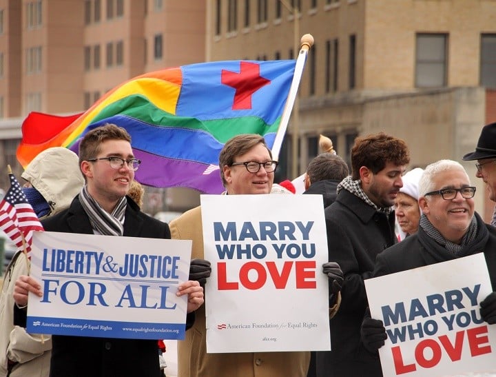 NORFOLK, VA - FEBRUARY 4:  Spencer Geiger, Carl Johansen and Robert Robert Roman protest for equal marriage outside the Walter E. Hoffman U.S. Courthouse as oral arguments in the case of Bostic v Rainey proceed on February 4, 2014 in Norfolk, Virginia, Virginia Attorney General Mark Herring has concluded that Virginia's ban on gay marriage is unconstitutional and he will no longer defend it in federal lawsuits.  (Photo by Jay Paul/Getty Images)