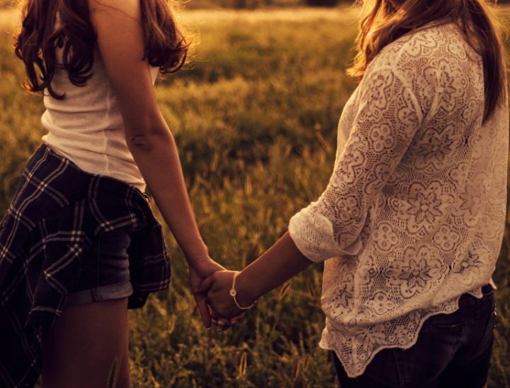SistersHoldingHandsFEAT
