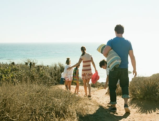 young family on beach holiday
