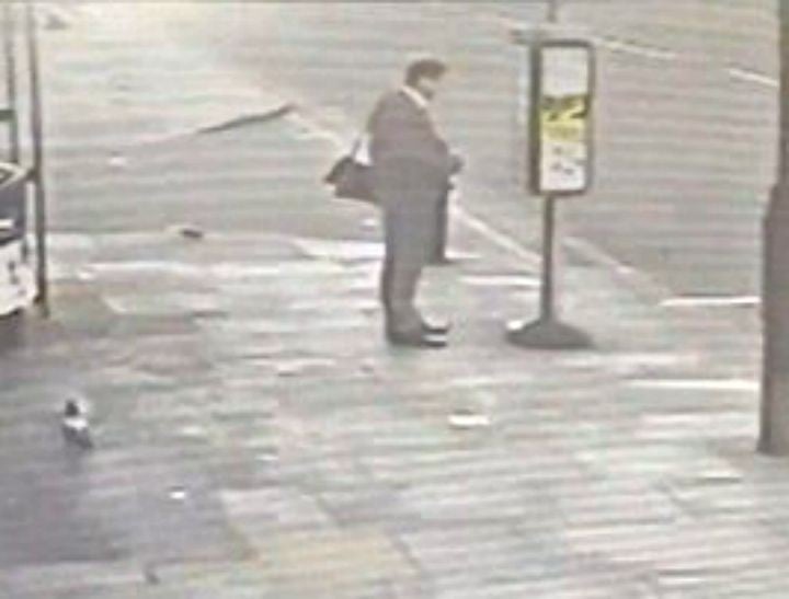 man cheats death at bus stop