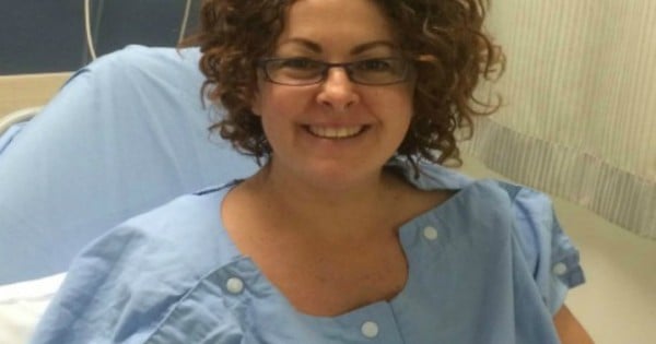 “I made vagina art for my husband and ended up in hospital.” Sharon Tierney - Sharon-Tierney-in-hospital-gown-600x315