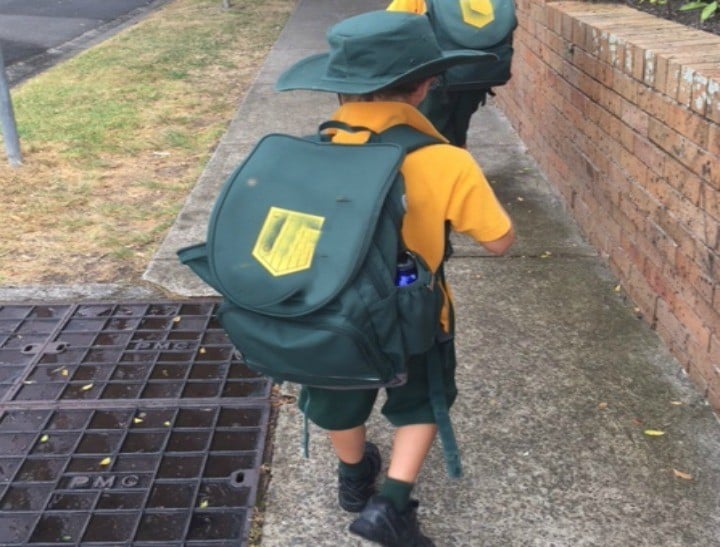 boys on way to school FI
