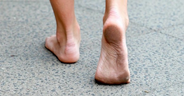 dirty feet on street.