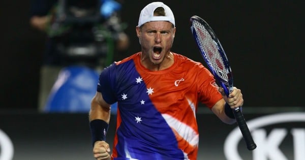 XXX of ZZZ plays a forehand in his/her first round match against XXXX of ZZZZ during day two of the 2016 Australian Open at Melbourne Park on January 19, 2016 in Melbourne, Australia.