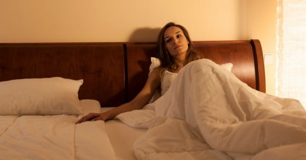 iStock_woman_bed_lonely_divorce