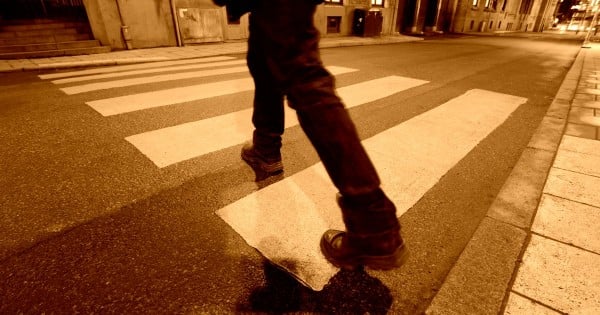 Istock man walkig alone night