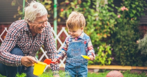 happy grandfather with grandson via iStock