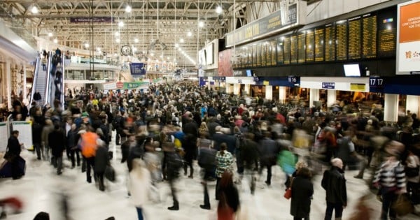 London, UK - October 13, 2012: Inside view of Waterloo Station, people present, since 1848, central London railway terminus, busiest railway terminus, served 91 million passenger between 2010 - 2011.