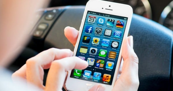 woman iphone istock