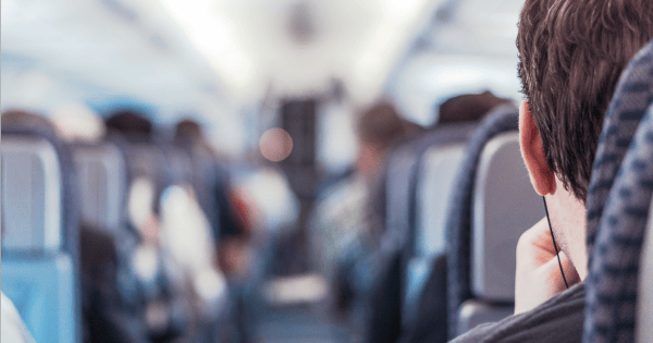 Man on plane nervous Pexels