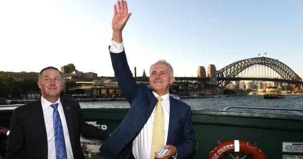 SYDNEY, AUSTRALIA - FEBRUARY 19: New Zealand Prime Minister John Key and Australian Prime Minister Malcolm Turnbull (R) Travel on a ferry on Sydney Harbour against the backdrop of the Sydney Harbour Bridge on February 19, 2016 in Sydney, The Prime Ministers are traveling to Australian Prime Minister, Malcom Turnbull's home in Point Piper. Key is in Sydney attending the annual Australia-New Zealand Leaders' meeting. (Photo by Dean Lewins/Pool/Getty Images)
