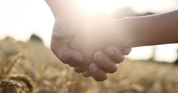 mother holding hands