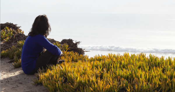 woman-staring-at-ocean-via-istock-600x315