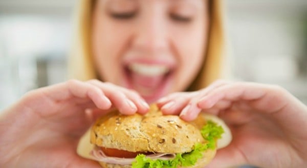 Woman eating a sandwich