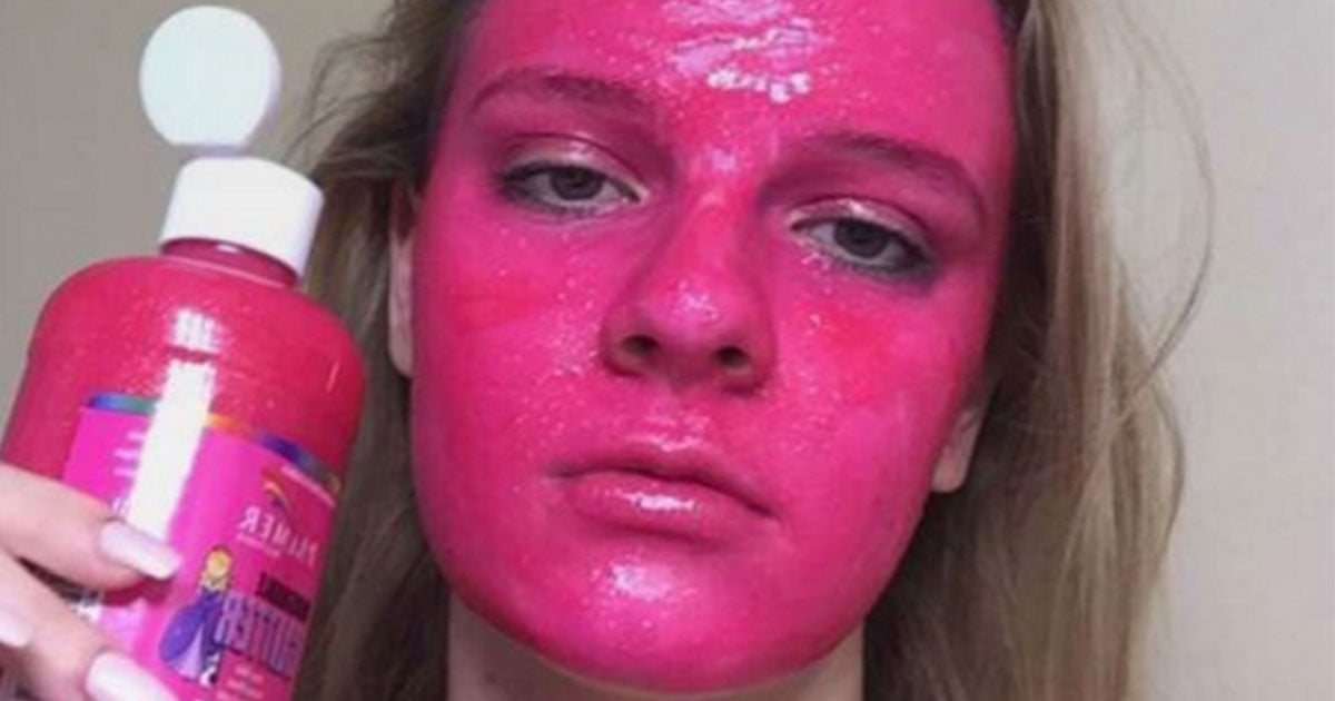 Girl paints face pink with glitter glue. Is now a Pink Panther lookalike.