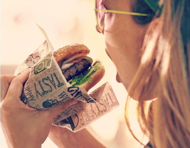 woman-eating-burger