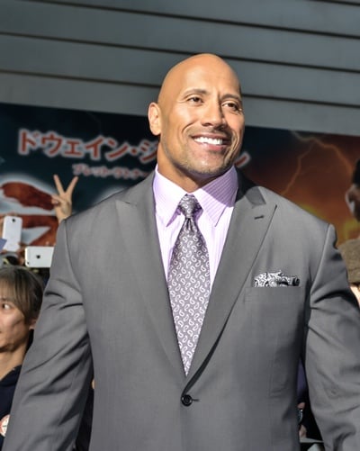 Dwayne Johnson earned $52 million in the 2013-2014 financial year,compared to J.Law's $34 million. Data via Forbes.  Image via Getty.
