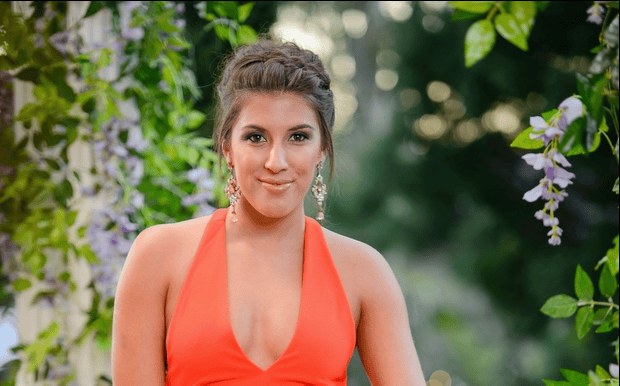 The Bachelor's Emily Simms flaunts cleavage in a VERY risqué