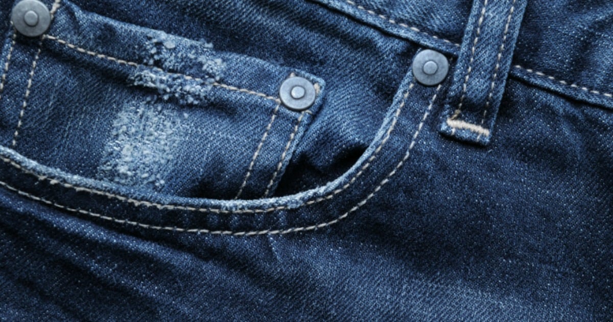 The real reason for that annoying little pocket in your jeans.