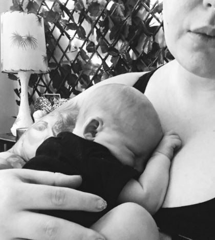 Tess Holliday shares breastfeeding snap as she details motherhood struggles