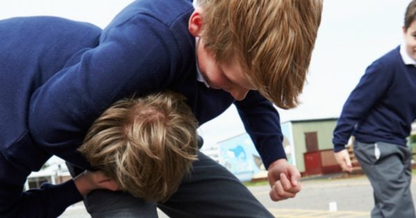 kid punching another kid