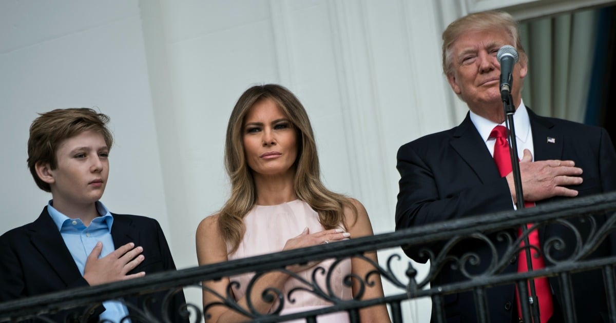 Melania Trump nudges President during national anthem; goes viral.