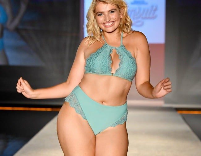 Plus size women catwalk in Miami for Sports show.