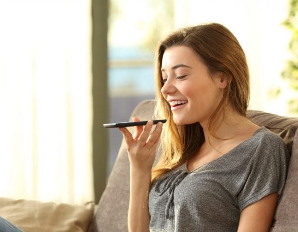 woman speaking smartphone