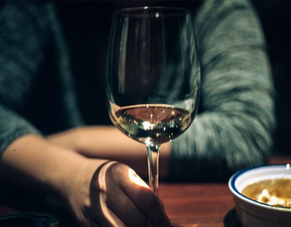 woman drinking wine alcoholic rehab