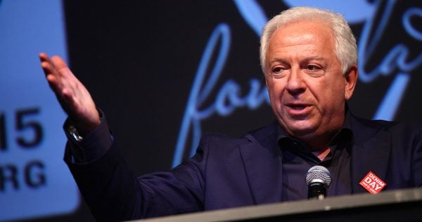 LOS ANGELES, CA - APRIL 29: Guess founder Paul Marciano speaks on stage at the GUESS Foundation and Peace Over Violence host 2015 Denim Day celebration at GUESS Headquarters on April 29, 2015 in Los Angeles, California. (Photo by Tommaso Boddi/WireImage)