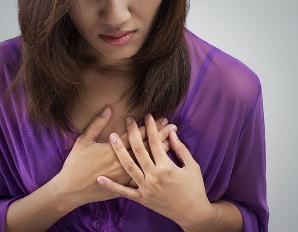woman holding heart