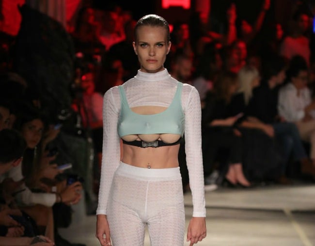 A catwalk at Milan Fashion Week has featured models with three breasts.