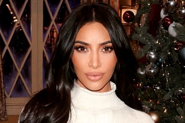 Kim Kardashian appears to be wearing butt pads with sheer skirt