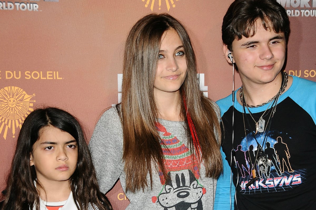 Blanket Jackson, Paris Jackson and Prince Michael Jackson attend the Los Angeles opening of 'Michael Jackson THE IMMORTAL World Tour' at Staples Center on January 27, 2012 in Los Angeles, California. (Photo by Jason LaVeris/FilmMagic)