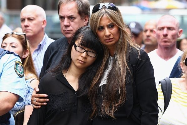 Victims Fiona Ma and Selina Win Pe at site of Sydney Siege in the week following. Image via Getty.