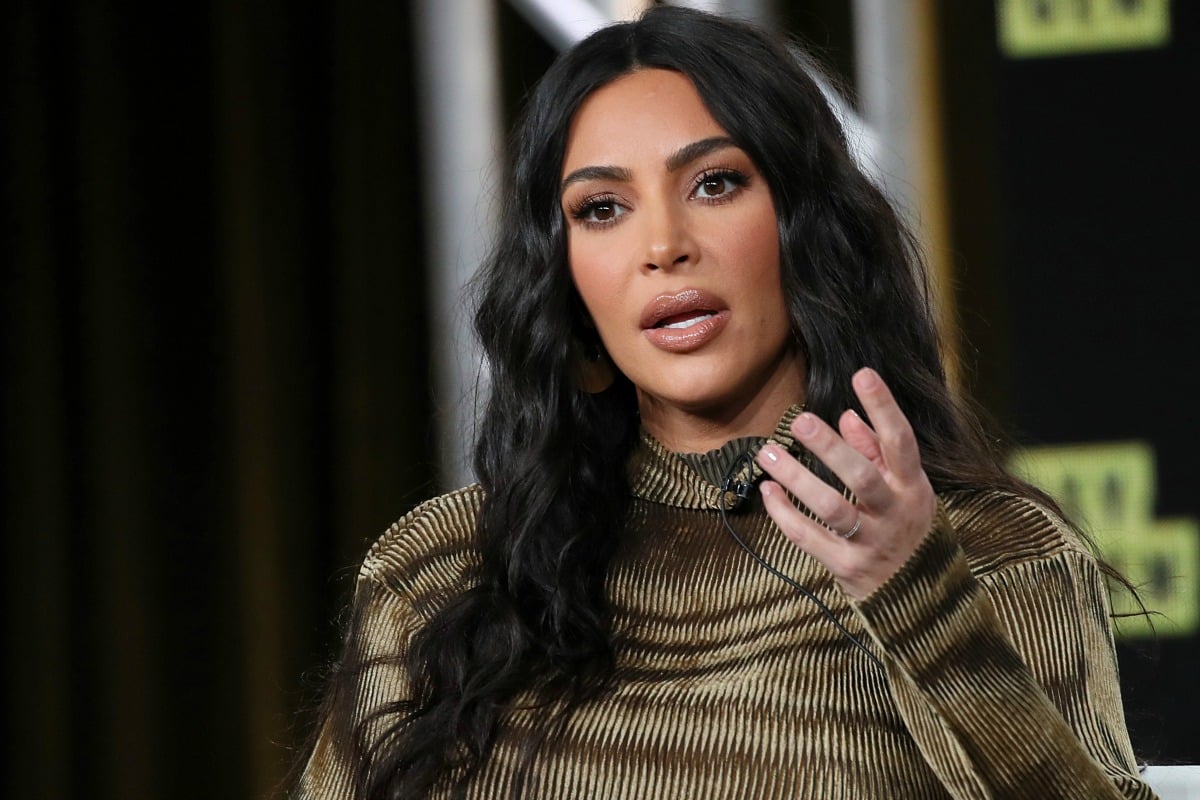 Kim Kardashian appears to be wearing butt pads with sheer skirt